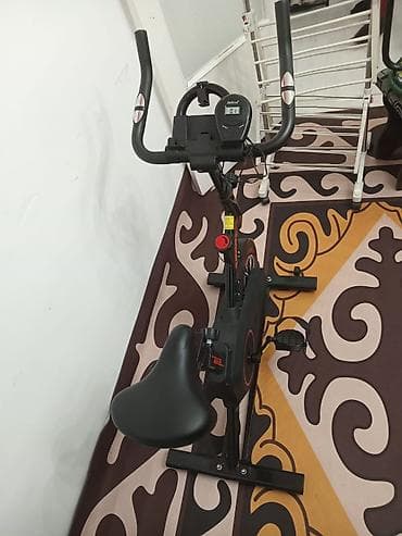 Эщиктин ролиги: Спин-байк (велотренажёр) для дома - Компактная рама, устойчивые опоры — 2
