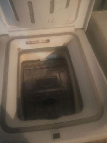 сушилка слива: Стиральная машина Indesit (вертикальная загрузка) узкая 5кг. - Тип — 5