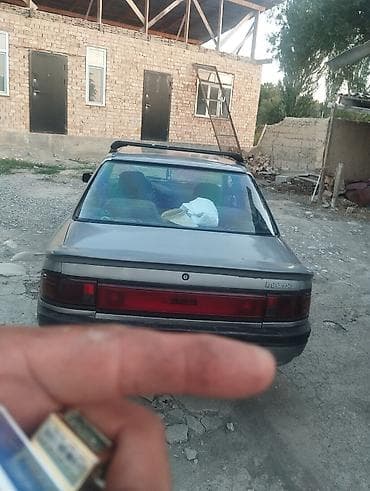 1: Mazda 323: 1989 г., 1.6 л, Механика — 1