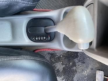 gac aion v: Mazda Demio: 2001 г., 1.3 л, Автомат, Бензин, Универсал — 6