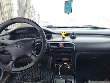 step spada: Mazda 626: 1993 г., 1.8 л, Механика, Бензин, Седан — 6