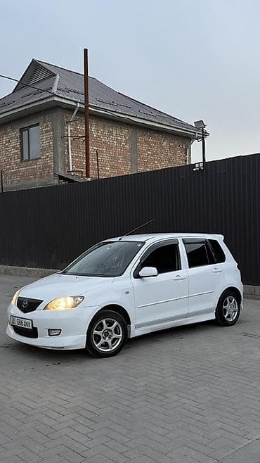 mazda 323 универсал: Mazda Demio: 2003 г., 1.3 л, Автомат, Бензин, Хэтчбэк — 2
