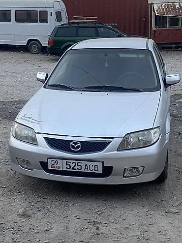 Mazda 323: 2002 г., 1.6 л, Механика, Бензин, Хэтчбэк