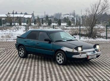 ваз 3107: Mazda 323: 1995 г., Хэтчбэк — 3