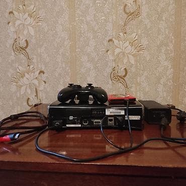 Портативные консоли: Игровая консоль Xbox 360 (Slim). Комплектация: - консоль Xbox 360 — 3