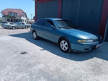 mazda 123: Mazda 626: 1995 г., 1.8 л, Механика, Бензин, Седан — 1