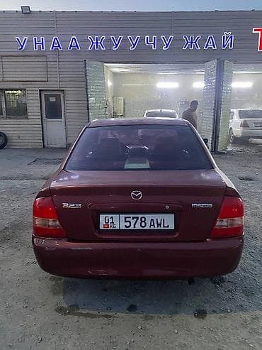 rx 7: Mazda 323: 2002 г., 1.8 л, Автомат, Бензин, Седан — 2