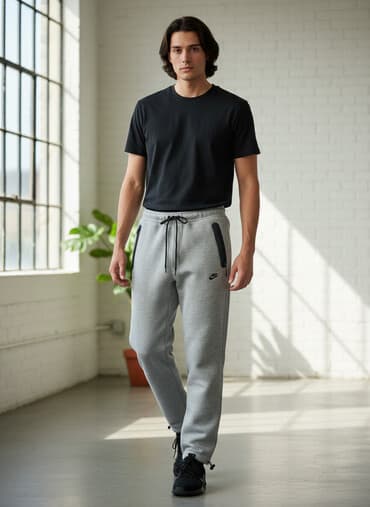 Спортивные штаны Nike, серый меланж. - Фасон: прямые джоггеры. - Пояс