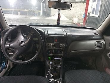 sg 9: Nissan Almera: 2001 г., 1.5 л, Механика, Бензин, Седан — 6