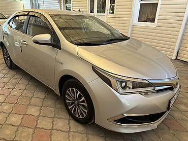 Toyota Corolla: 2019 г., 1.8 л, Автомат, Гибрид, Седан