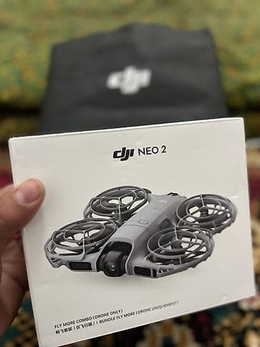 DJI NEO 2 — компактный квадрокоптер с защитой винтов и камерой для