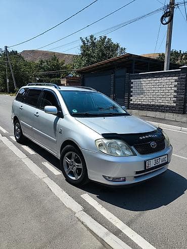 Унаа сатуу: Toyota Corolla: 2002 г., 1.6 л, Кол менен иштөөчү, Бензин, Универсал — 3