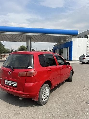 Mazda Demio: 2003 г., 1.3 л, Автомат, Бензин, Хэтчбэк — 4