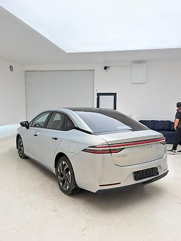 GAC: Электромобиль GAC Aion S Plus, серебристый седан Основные — 7