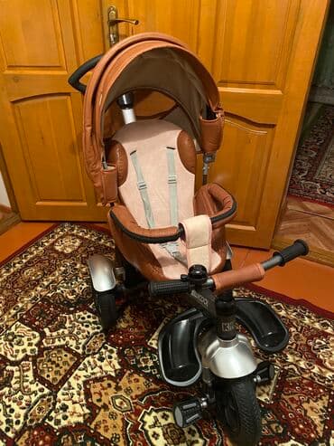 сколько стоит детская коляска: Коляска, цвет - Коричневый, Новый — 1