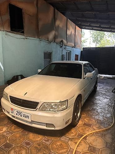 lancer evolution: Nissan Laurel: 2002 г., 2 л, Автомат, Газ, Седан — 1