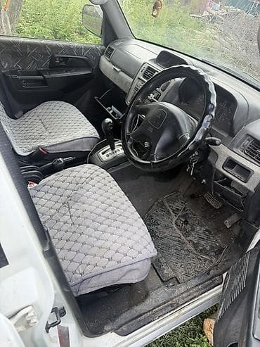 маз водовоз: Mitsubishi Pajero iO: 1998 г., Внедорожник — 6