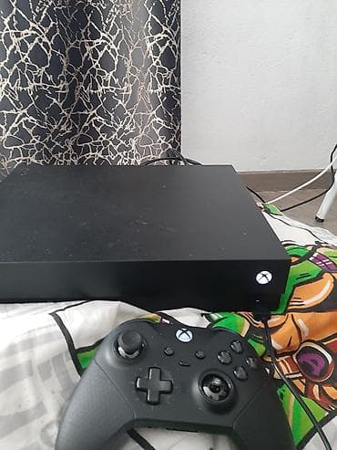 плестейшын 5: Игровая консоль Microsoft Xbox One X с геймпадом - — 1