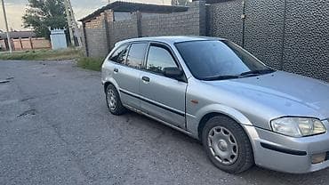 шевролет монзо: Mazda 323: 1999 г., 1.5 л, Механика, Бензин, Хэтчбэк — 3