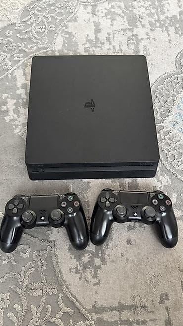 PlayStation 4 Slim (черная) Комплектация: - консоль PS4 Slim - 2