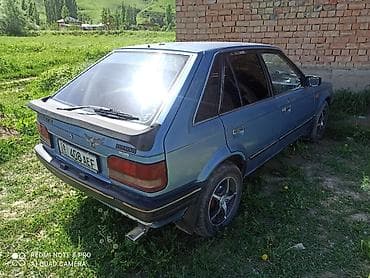 для такси авто: Mazda 323: 1985 г., 1.5 л, Механика, Бензин, Хэтчбэк — 1