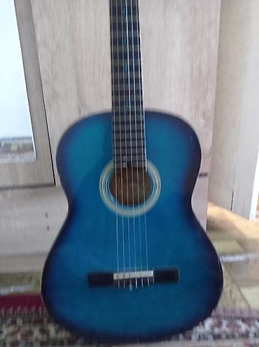 Велосипеддер: Классическая акустическая гитара 4/4, корпус полноразмерный. Цвет — — 7