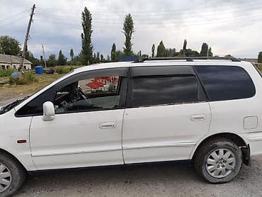 тойота приус с: Honda Odyssey: 1997 г., 2.3 л, Автомат, Газ, Универсал — 1