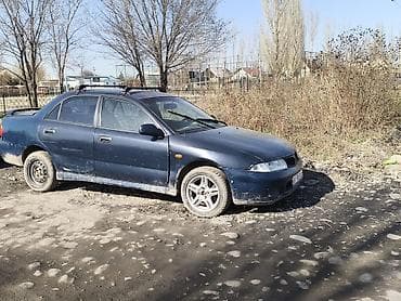 matiz bar: Mitsubishi Carisma: 1997 г., 1.6 л, Механика, Бензин, Седан — 2