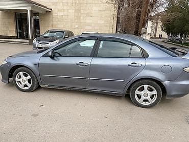 cx 9: Mazda 6: 2001 г., 1.8 л, Ручные, Бензин, Седан — 6