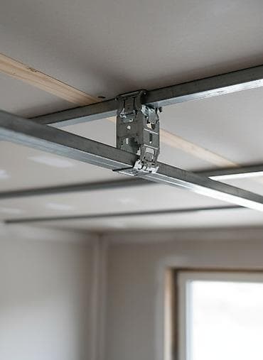 Соединитель двухуровневый Knauf для профилей ПП 60х27. Предназначен