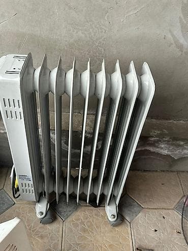 отопительный котёл: Масляный обогреватель Кол-во секций: 9, Несколько режимов мощности — 1