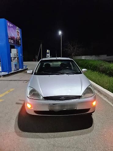 Ford Focus: 1999 г., 1.6 л, Механика, Бензин, Седан