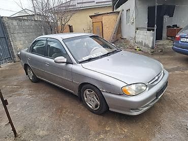 mazda 3: Kia Sephia: 1999 г., 1.8 л, Механика, Бензин, Седан — 3