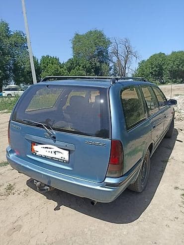 глушитель на опель зафира а: Nissan Primera: 1994 г., Механика — 3