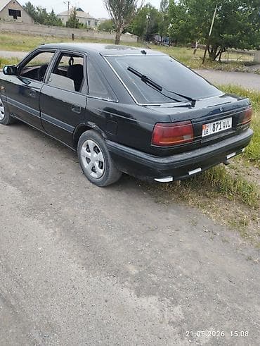 210 cdi: Mazda 626: 1990 г., 2 л, Механика, Бензин, Хэтчбэк — 1