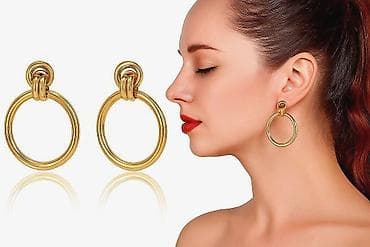 Серьги сөйкөлөр У в виде крупных золотистых колец с узловым креплением