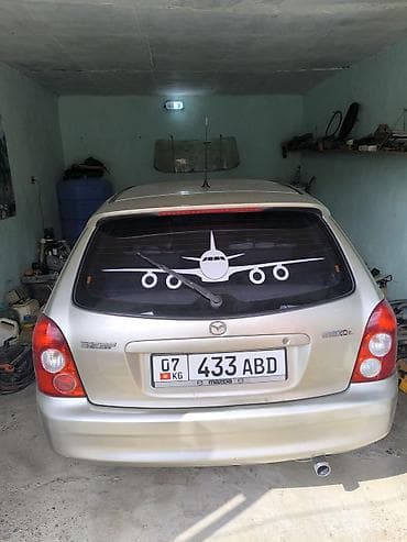 авто сокулук: Mazda 323: 2003 г., 1.6 л, Кол менен иштөөчү, Бензин, Хетчбек — 2