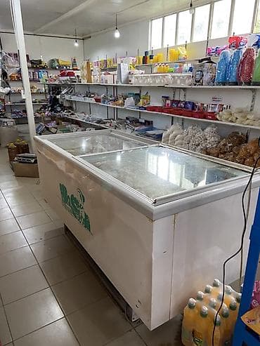 Горизонтальный морозильный ларь с раздвижными стеклянными крышками -