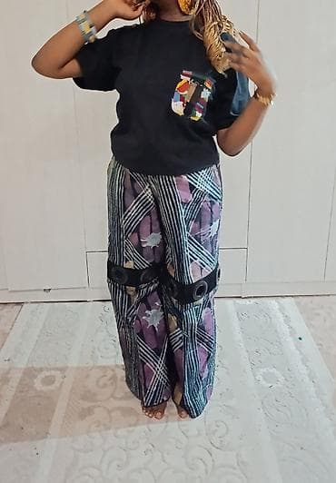 пит тарак: Стильный комплект: Брюки-палаццо с люверсами Яркий. Современный — 1