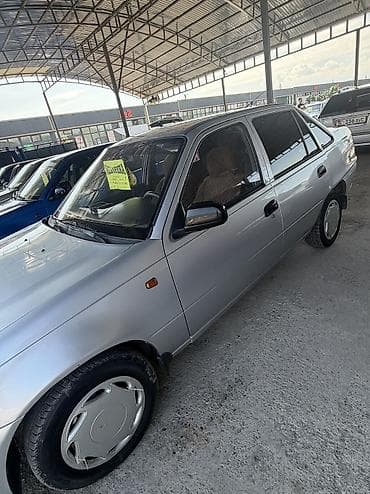 5 110: Daewoo Nexia: 2010 г., Механика, Бензин, Седан — 3