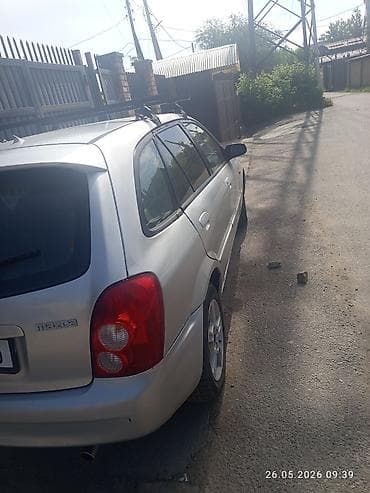 dot 4: Mazda 323: 2002 г., 1.6 л, Механика, Бензин, Универсал — 5