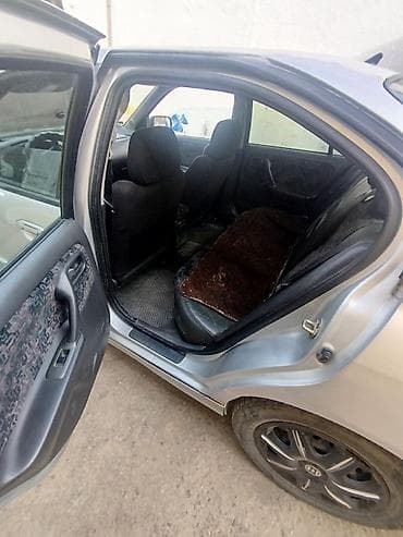 Унаа сатуу: Nissan Primera: 1998 г., 2 л, Кол менен иштөөчү, Седан — 3