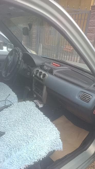 wuling mini ev: Nissan Micra: 2001 г., 1.4 л, Автомат, Бензин, Хэтчбэк — 5