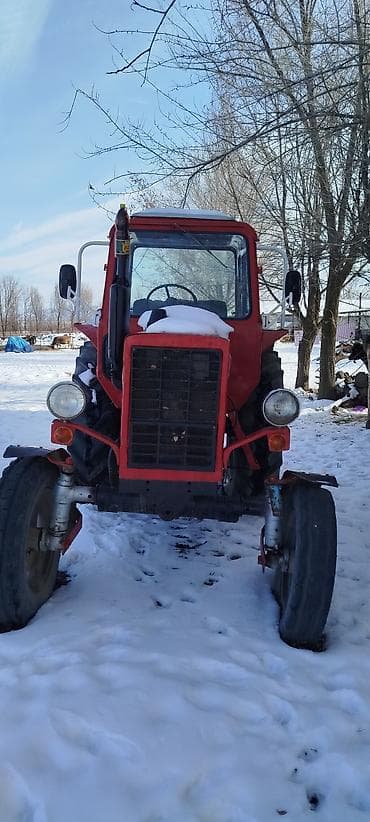 Трактор «Беларус» (МТЗ), кабина закрытая, красный цвет. прошу 500.000