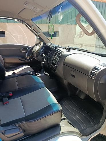 авто компании: Hyundai Porter II бортовой грузовик - Компоновка: однорядная кабина — 4