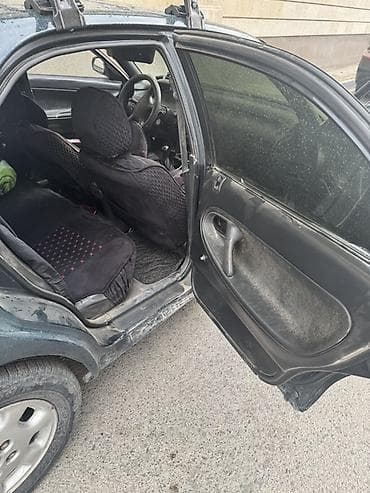 Mazda 626: 1995 г., 1.8 л, Механика, Бензин — 8