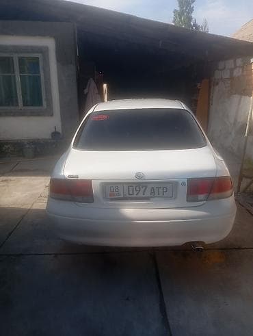 tesla p40: Mazda 626: 1992 г., 1.8 л, Механика, Бензин, Седан — 4