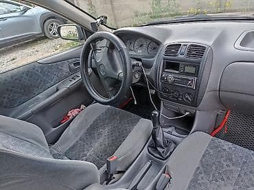 launch pro elite: Mazda Protege: 1998 г., 1.6 л, Механика, Бензин, Хэтчбэк — 5
