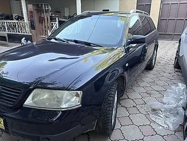 коврик на торпеду: Audi A6: 1998 г., Механика, Бензин, Универсал — 1