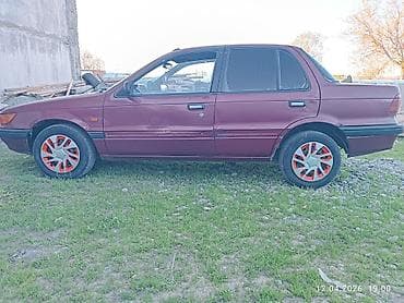 кадамжай авто: Mazda 323: 2026 г., Кол менен иштөөчү, Седан — 5